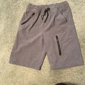 Cat and jack. Size 12/14. Boys shorts but son wore ad a swimsuit.